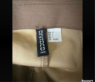 Pantaloni aderenti in pelle marrone