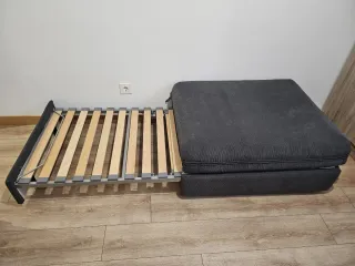 Puf convertible en cama gris y marrón con cojín