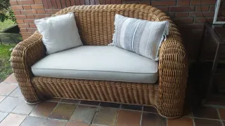 Sofá de ratán para jardín con cojines