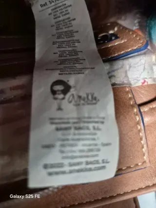 Mochila y monedero Anekke azul y multicolor