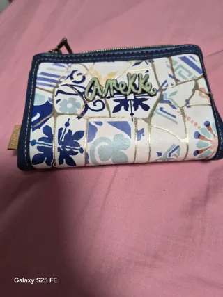 Mochila y monedero Anekke azul y multicolor