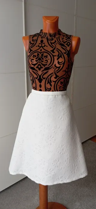 Body vintage, maillot marrón y negro.