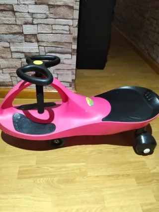 Patinete infantil rosa esta usado pero perfecto.