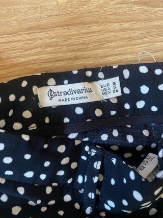 Falda corta lunares negra y blanca