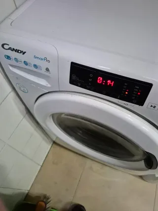 Lavadora y Secadora Candy SmartPro.9kg lavado .6kg