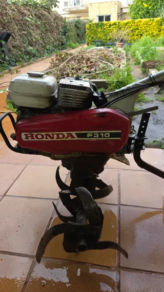 Motoazada Honda F310. incluye rueda de transporte.