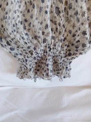 Camisa escote asimétrico estampado