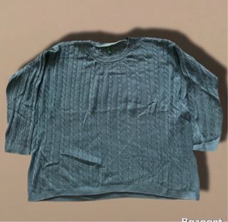 Maglione azzurro a trecce