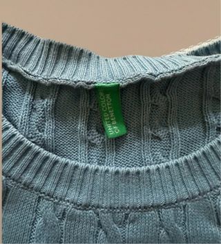 Maglione azzurro a trecce