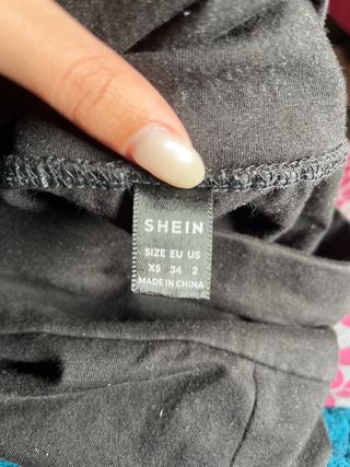 Pantalones negros campana