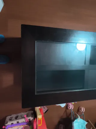 Mesa de centro de madera y cristal