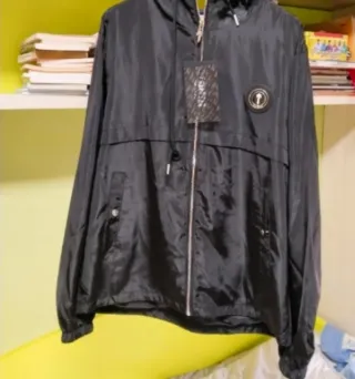 Cortavientos chico talla M negro