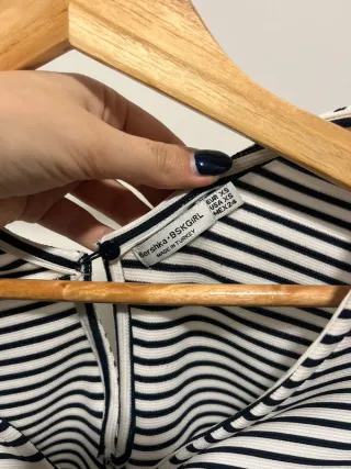 Macacão de calção às riscas