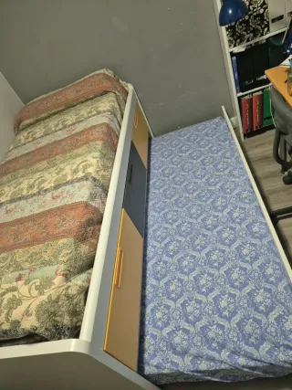 Cama nido blanca y amarilla