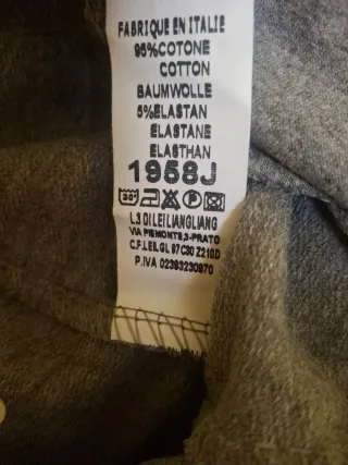 Pantaloni grigi con fiocco