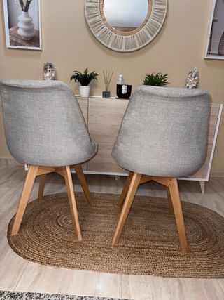 Mesa de cristal redonda con 4 sillas