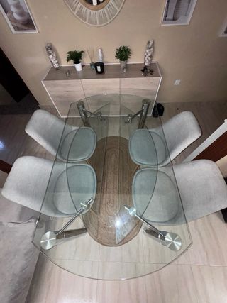 Mesa de cristal redonda con 4 sillas