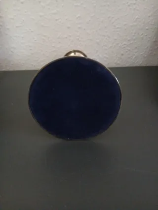 Portavelas de metal plateado