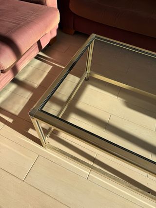 Mesa de centro cristal y metal dorado