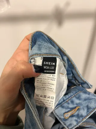 Calças cintura assimétrica