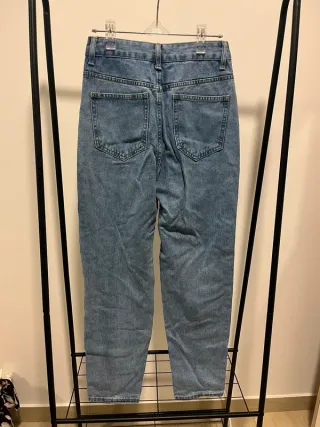 Calças cintura assimétrica