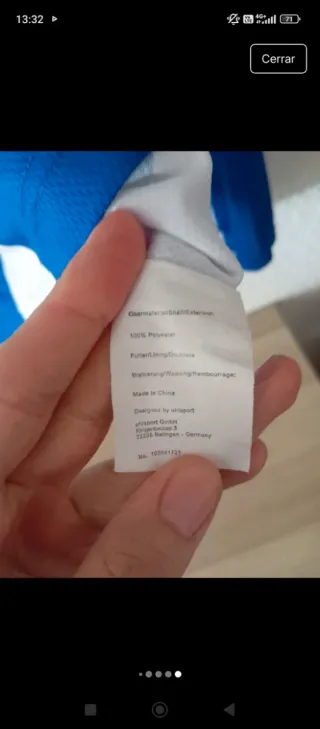 Camiseta Uhlsport azul y blanca Talla S