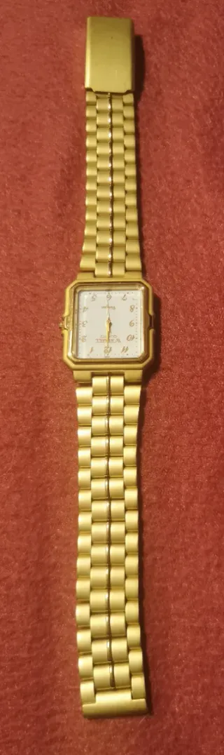 Reloj Windmill Dorado Mate.