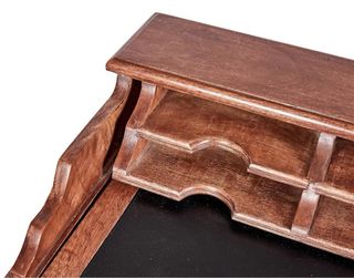 Escritorio antiguo de madera y cuero