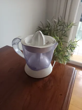 Exprimidor eléctrico Pacson