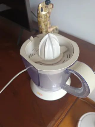 Exprimidor eléctrico Pacson