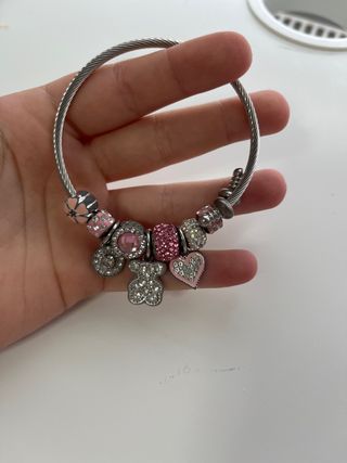 Pulsera plata con charms rosas