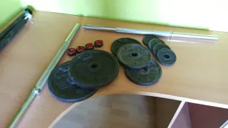 Barra y discos de pesas