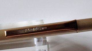 Pelikan penna a sfera acciaio dorato