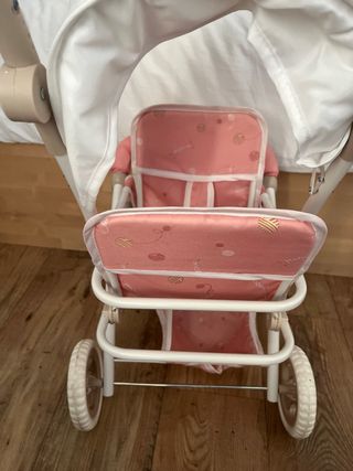 Carrito gemelar de juguete rosa ( juguettos ).