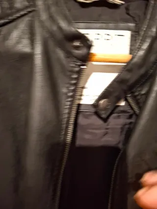 Chaqueta Esprit Negra de Chico por no usarla.