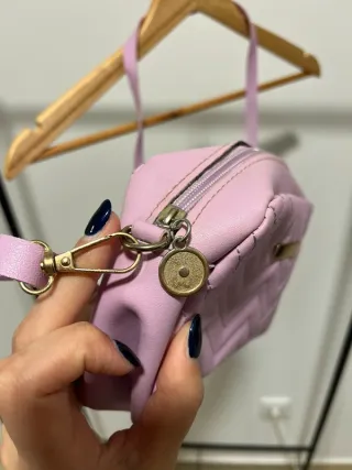 Mala lilás a tira colo