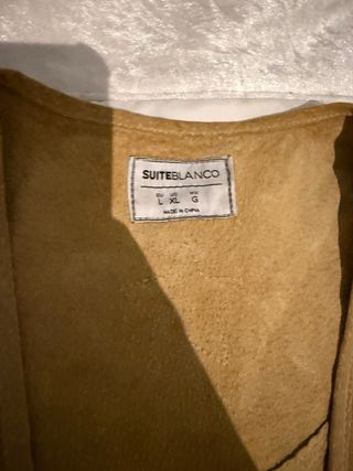 Chaleco de piel con flecos para mujer