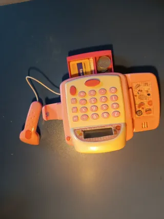 Caja registradora de juguete rosa