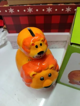 Hucha leones apilados nueva