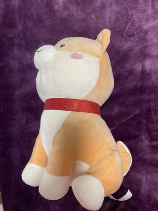 Dos peluches de perro Shiba Inu