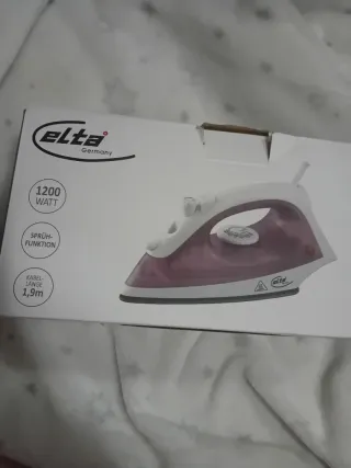 Plancha de vapor ropa nueva