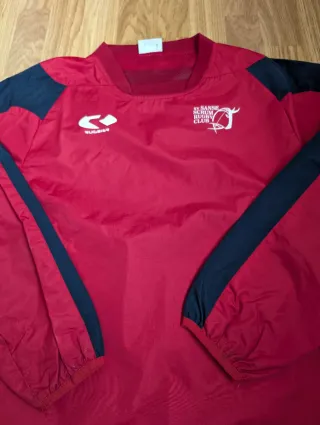 Cortavientos rojo niño T.14