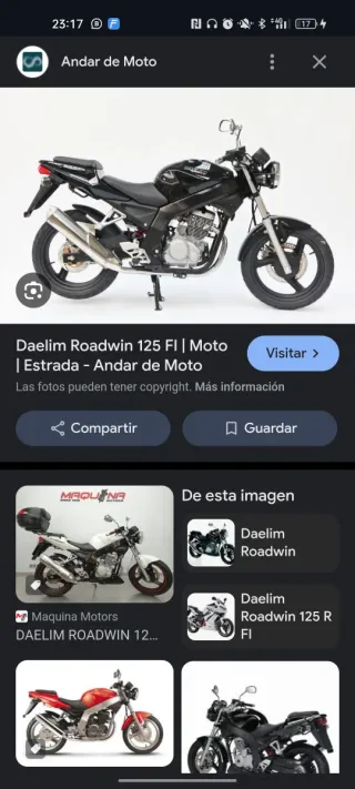 Moto  Negra con Baúl