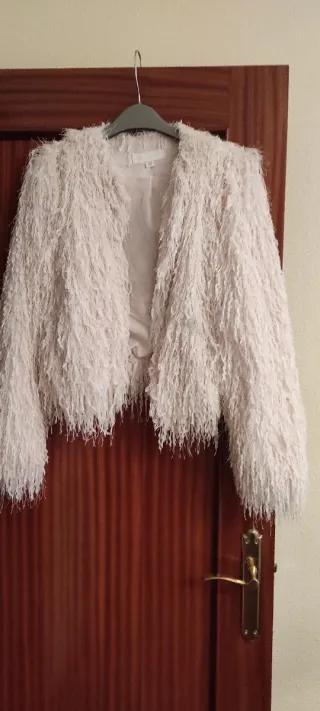 Chaqueta beige con brillo