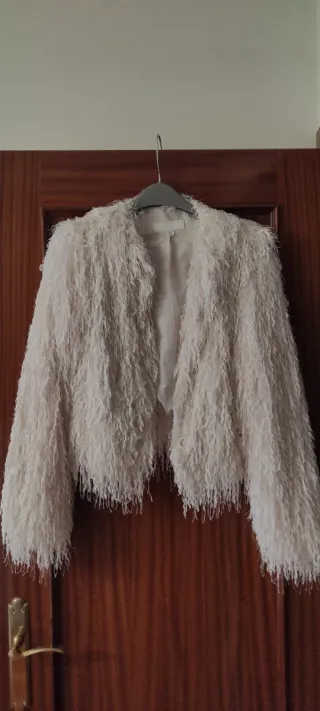 Chaqueta beige con brillo