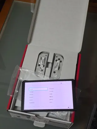 Nintendo Switch OLED completa + extras