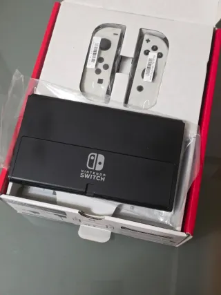 Nintendo Switch OLED completa + extras