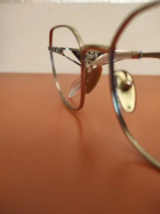 Montatura occhiali Prada oro