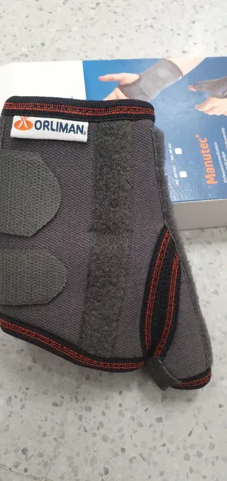 Muñequera Orliman con férula pulgar izq.