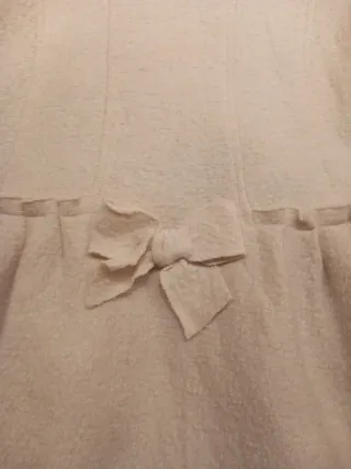 Abrigo blanco entretiempo de Tizzas para niña.